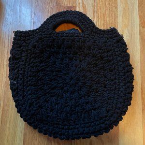 Black purse weaved/crochet by Clare V.